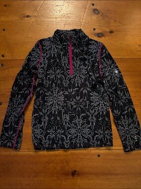 Girls black snow flake patterned Half-Zip with Pink Trim